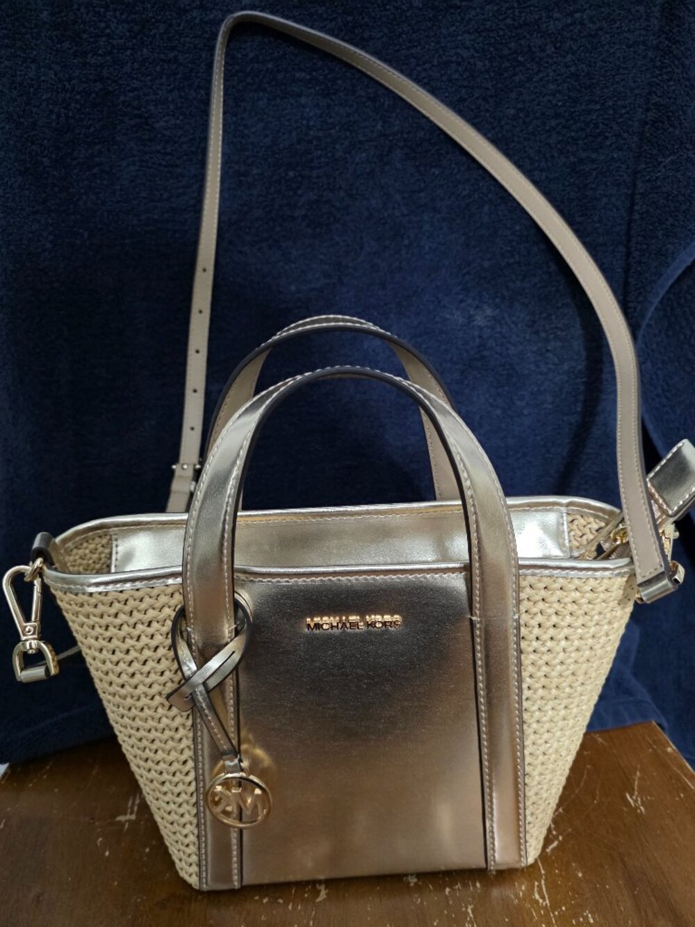 Michael Kors gold hand bag/crossbody